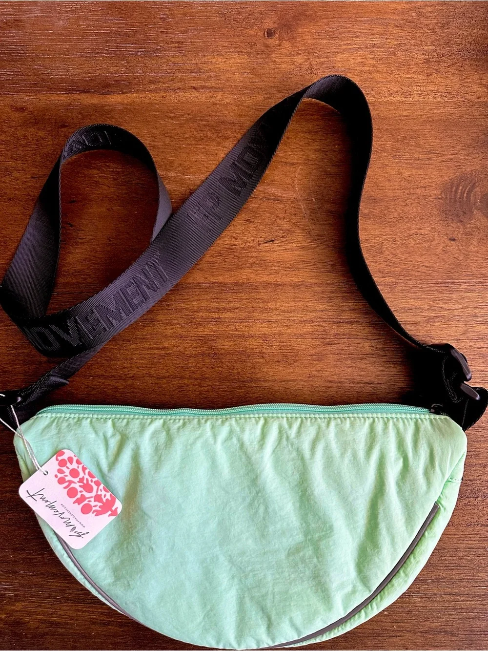 NWT FREE PEOPLE MOVEMENT BULL’S EYE CROSSBODY SLING BAG COLOR IS PISTACHIO!!